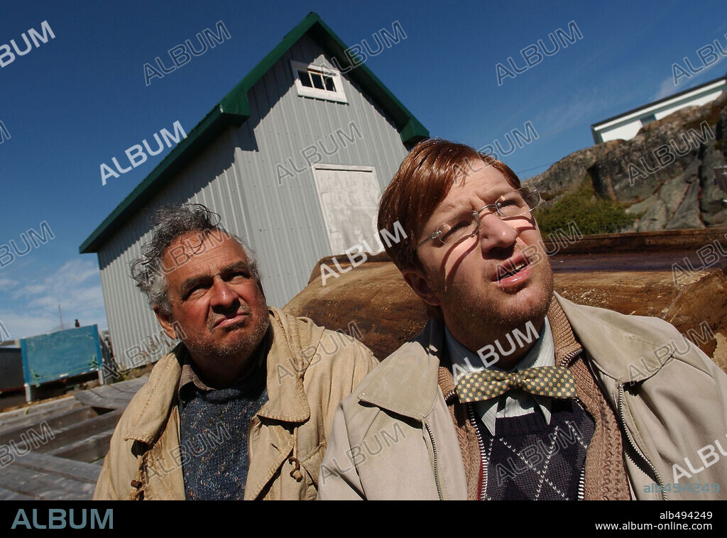 BENOIT BRIERE and RAYMOND BOUCHARD in SEDUCING DOCTOR LEWIS, 2003 (LA GRANDE SEDUCTION), directed by JEAN-FRANÇOIS POULIOT. Copyright MAX FILMS PRODUCTIONS.