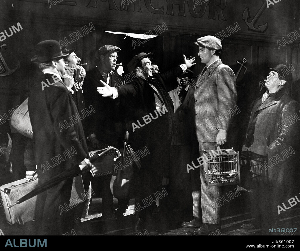 JOHN WAYNE y THOMAS MITCHELL en HOMBRES INTRÉPIDOS, 1940 (THE LONG VOYAGE HOME), dirigida por JOHN FORD. Copyright UNITED ARTISTS.