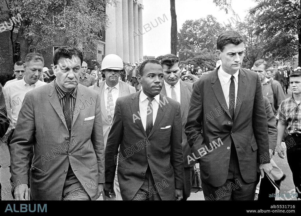 James Meredith, first African-American student admitted to University of Mississippi, walking to class accompanied by U.S. Marshals, Oxford, Mississippi, USA, Marion S. Trikosko, U.S. News & World Report Magazine Photograph Collection, October 1, 1962.