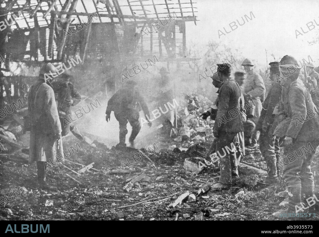 French troops using flamethrowers to flush out Germans from their shelters, Cantigny, France, 1918. French flamethrower teams supported the attack by the American 1st Division on the village of Cantigny on 28 May 1918.