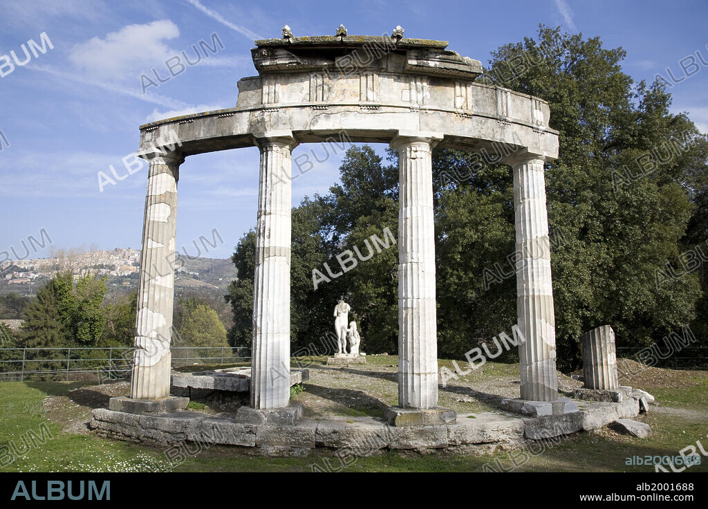 Italy, Tivoli - Hadrian's Villa (Villa Adriana) - Temple of Venus. Hadrian's Villa was the luxurious retreat of Emperor Hadrian in Tibur (today: Tivoli). It was built in the 2nd century AD as a home for the emperor and his court. The Temple of Venus is a copy of the Greek tholos that guarded the original Aphrodite of Knidos by Praxiteles. The temple is in the Doric order. The villa was declared World Heritage Site by UNESCO in 1999.