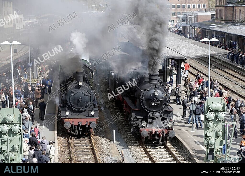 Dampfspektakel 2010 steam train show at Gerolstein station, passenger train engine 2455 Posen, left, with freight train engine 58311, Gerolstein, Rhineland-Palatinate, Germany, Europe.