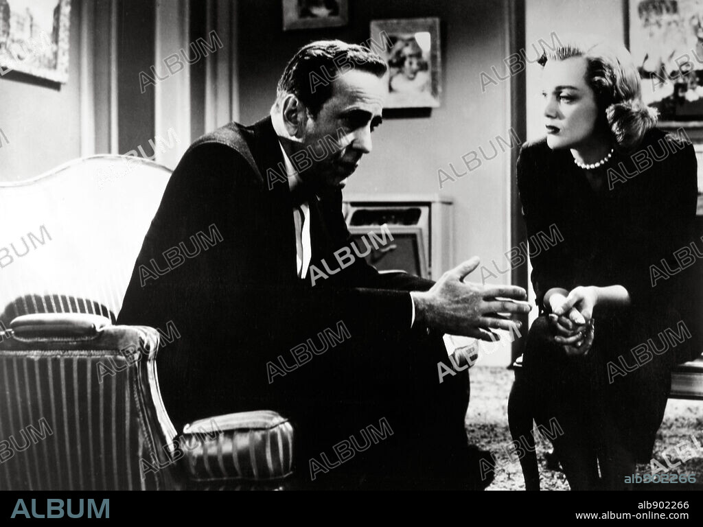 HUMPHREY BOGART and JAN STERLING in THE HARDER THEY FALL, 1956, directed by MARK ROBSON. Copyright COLUMBIA PICTURES.
