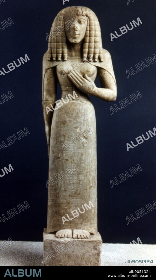 limestone Cretan sculpture called the Lady of Auxerre, (or Kore of Auxerre). Depicts an archaic Greek goddess of c. 650 - 625 BC. It is a Kore (maiden), perhaps a votary rather than the maiden Goddess Persephone. The Archaic sculpture, bearing traces of polychrome decoration, dates from the 7th century BCE, when Greece was emerging from its Dark Age. She still has the narrow waist of a Minoan-Mycenaean goddess, and her stiff hair suggests Egyptian influence.