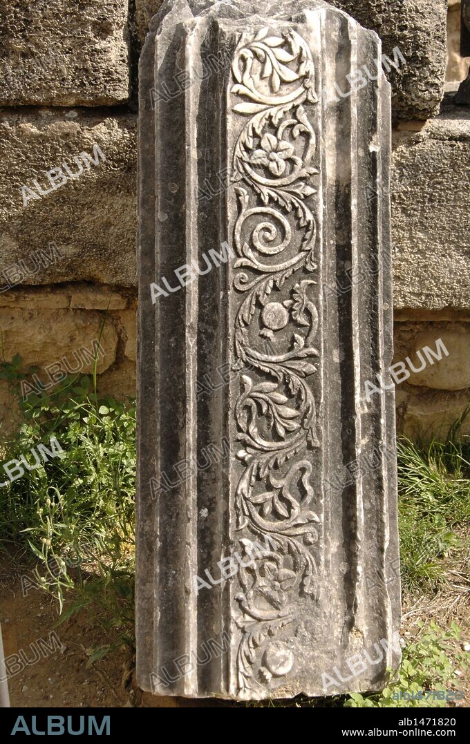 Greek Art. Phidias Workshop ruins, built in 430 BC to house the statue of Zeus. In the fifth century, Theodosius II turned the building into an early Christian church. Shaft with relief. Olympia. Greece.