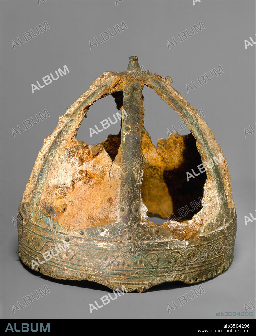 Helmet (Spangenhelm), 6th–7th century, Byzantine or Germanic, Iron, copper alloy, gold, H. 8 9/16 in. (21.8 cm); Diam. 7 13/16 in. (19.9 cm); Wt. 2 lb. (907 g), Helmets, This helmet comes from a small group of closely related Spangenhelme (strap helmets). The sites where they have been found are widely scattered, ranging from Sweden to Germany, the Balkans and Libya.