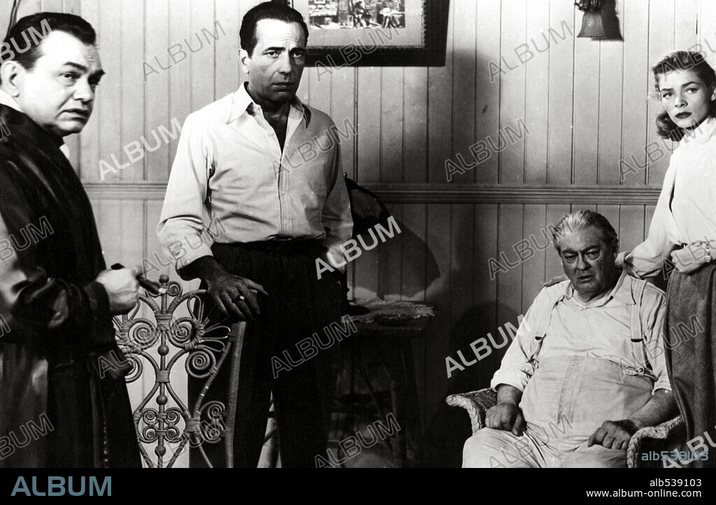 EDWARD G. ROBINSON, HUMPHREY BOGART, LAUREN BACALL and LIONEL BARRYMORE in KEY LARGO, 1948, directed by JOHN HUSTON. Copyright WARNER BROTHERS.