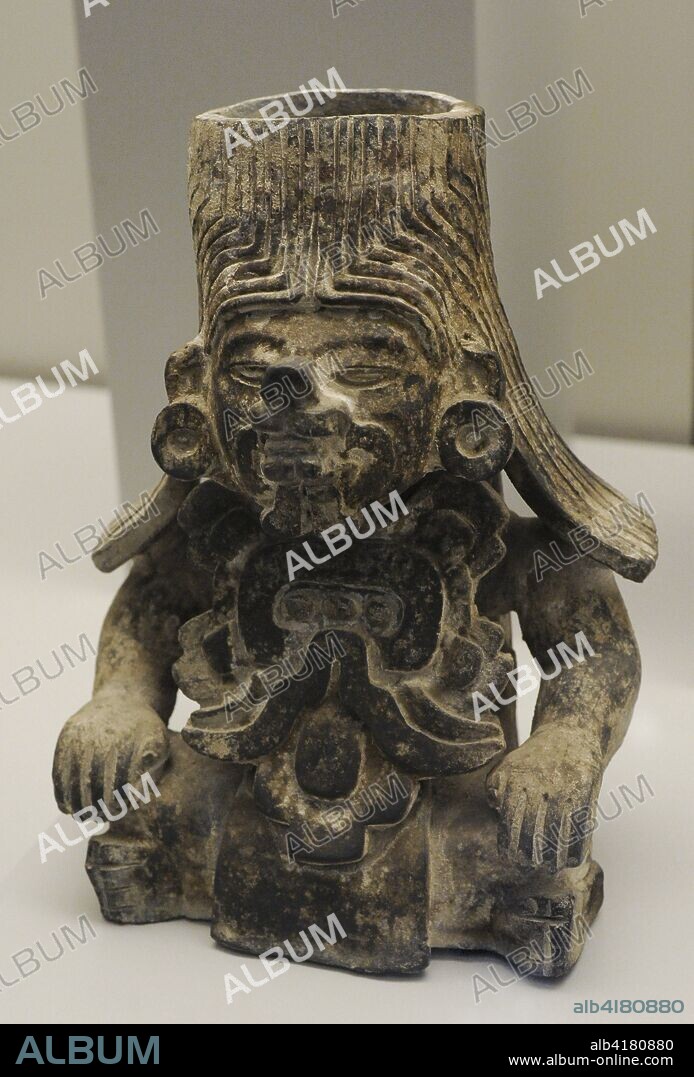 Vaso con figura humana de rasgos felínicos. Cerámica. Cultura Zapoteca (Monte Albán III). Período Clásico Temprano y Medio (100-700 d. C.). México. Museo de América. Madrid. España.