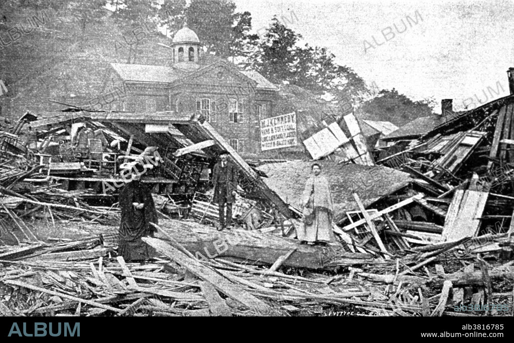 The Johnstown Flood (or Great Flood of 1889 as it became known locally) occurred on May 31, 1889. It was the result of the catastrophic failure of the South Fork Dam situated on the Little Conemaugh River 14 miles upstream of the town of Johnstown, Pennsylvania, made worse by several days of extremely heavy rainfall. The dam's failure unleashed a torrent of 20 million tons of water  from the reservoir known as Lake Conemaugh. The flood killed 2,209 people and caused $17 million in damages. It was the first major disaster relief effort handled by the new American Red Cross, led by Clara Barton. Support for victims came from all over the United States and 18 foreign countries. After the flood, survivors suffered a series of legal defeats in their attempts to recover damages from the dam's owners, prompting the development in American law changing a fault-based regime to strict liability. Photo originally captioned: The aftermath of the Johnstown Flood. "Johnstown - View Cor. Main and Clinton Streets." In: "History of the Johnstown Flood", by Willis Fletcher Johnson, 1889.