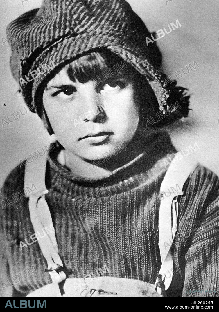 JACKIE COOGAN en EL CHICO, 1921 (THE KID), dirigida por CHARLES CHAPLIN. Copyright FIRST NATIONAL.