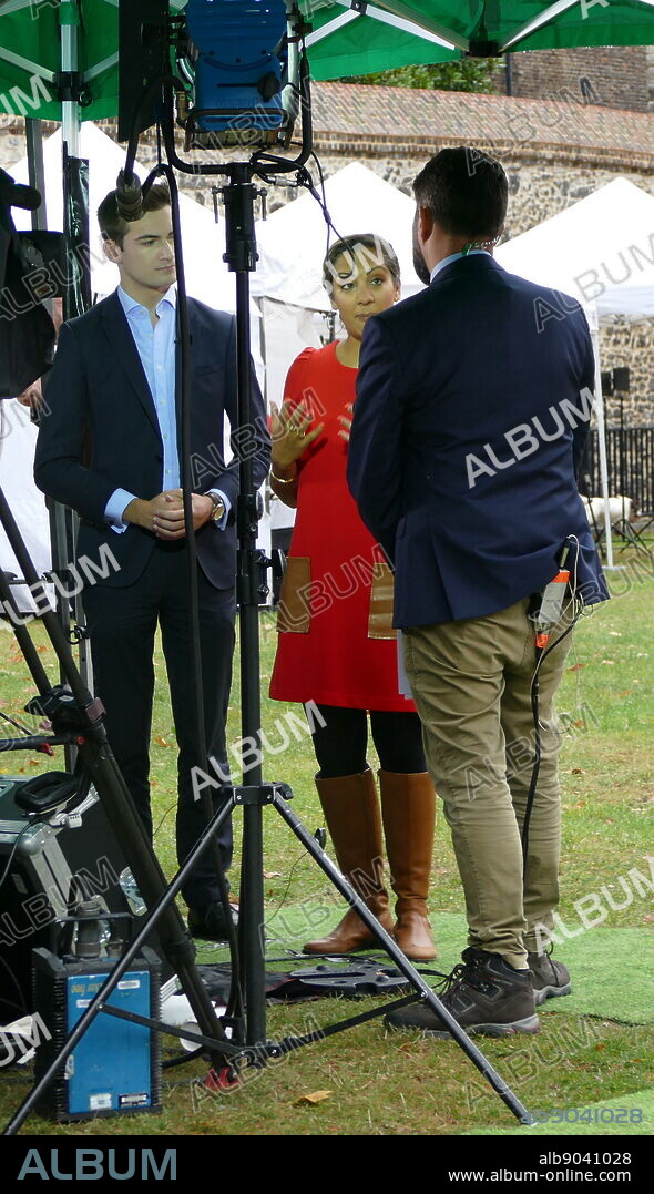 Lewis Goodall is a political correspondent for Sky News seen with Journalist Sonia Sodha. College Green, Parliament, London. September 2019.