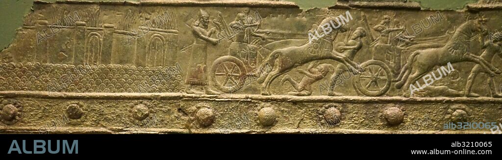 The Balawat Gates, three sets of gates from Balawat, an ancient Assyrian Empire, with embossed scenes showing scenes of warfare, the presentation of tribute and hunting of Lions and bulls.