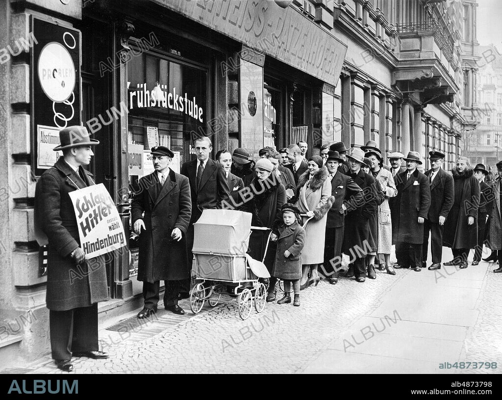 GERMANY BERLIN 1932-04-10. Orig. caption ... THE BERLIN'S FACE ON ELECTION DAY. BERLIN - On April 10, 1932, as Berlin's second for the Reich presidential election, the city made a very lively impression. - Mothers who could not leave their children at home alone, take them to the polls, and let the prams stand in front of the door of the polling station. Picture shows: Mothers with children and prams in front of a polling station in the west of Berlin. Photo: New York Times / AB Text & Bilder / SVT / Code: 5600 Folder: Germany Presidential election 1932-04-10 (2nd round of elections) Election day 4939 Election campaigns sites: BERLIN; GERMANY.