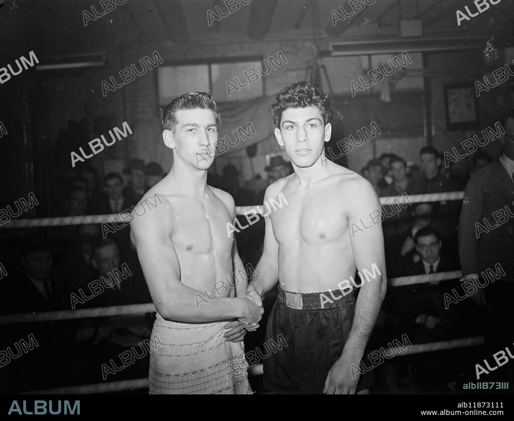 FALLON AND CANTOR WEIGH - IN. PETER FALLON , of Birkenhead , and SOLLYCANTOR , the Canadian light - weight , weighted - in at a London gymnasium for their Albert Hall fight . PICTURE SHOWS :- PETER FALLON (left ) and SOLLY CANTOR , of Canada , at the weigh - in . 21 February 1949.