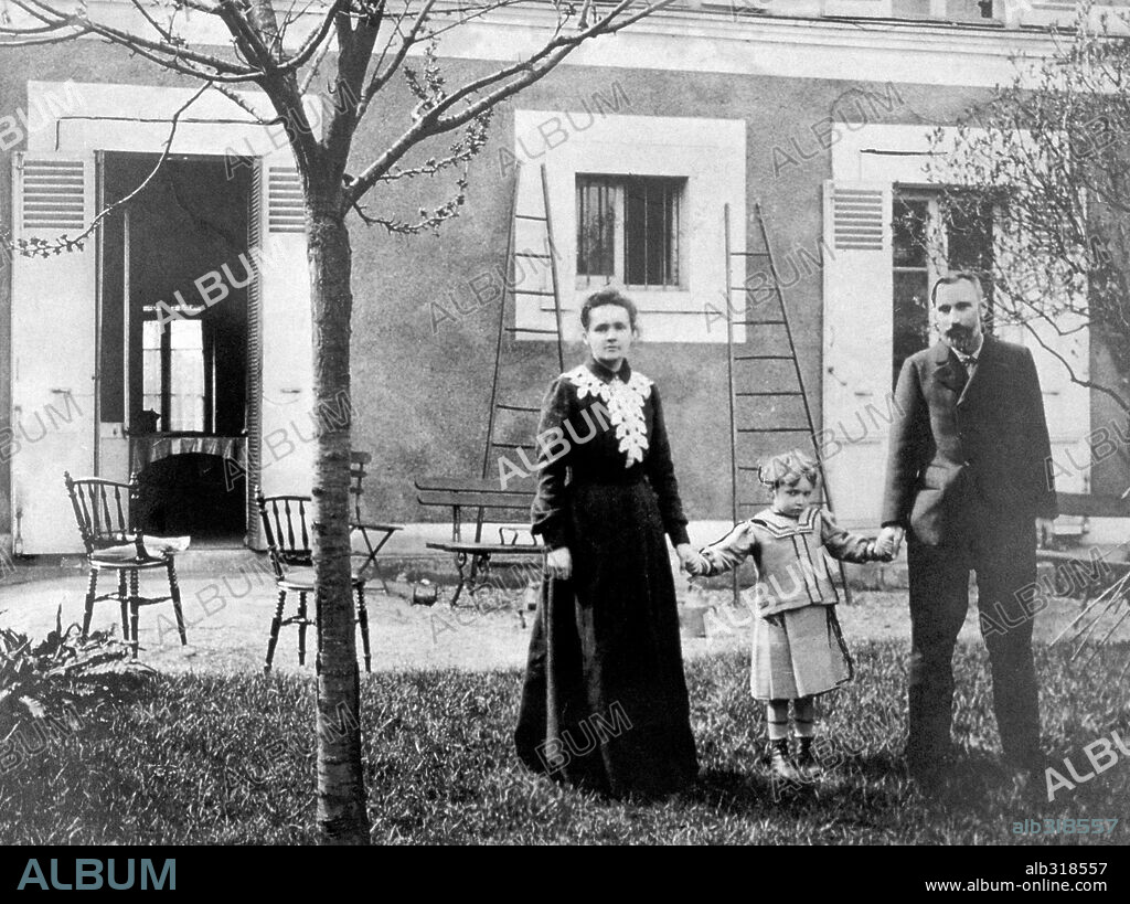 Marie Curie and her husband Pierre, with their daughter Irene, in the garden of their home near Paris. Circa 1898-1900.