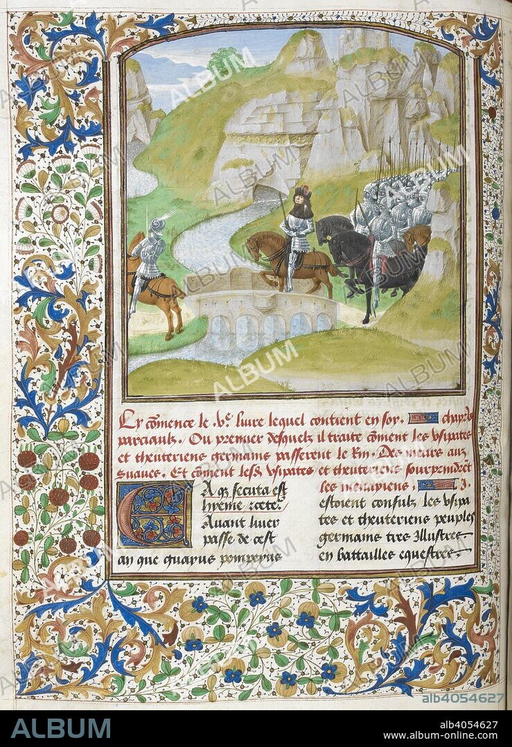 JULIO CESAR, JEHAN DU QUESNE et MASTER OF THE LONDON WAVRIN. Germanic army crossing the Rhine (Book 5).  Army crossing a river by a bridge, with landscape in the background. Text beginning with decorated initial 'E'. Caesar, translated by Jan Du Quesne (or Jean Duchesne), Bellum Gallicum ( Les commentaires de Cesar ). 1473-1476. Source: Royal 16 G. VIII, f.147v. Language: French.