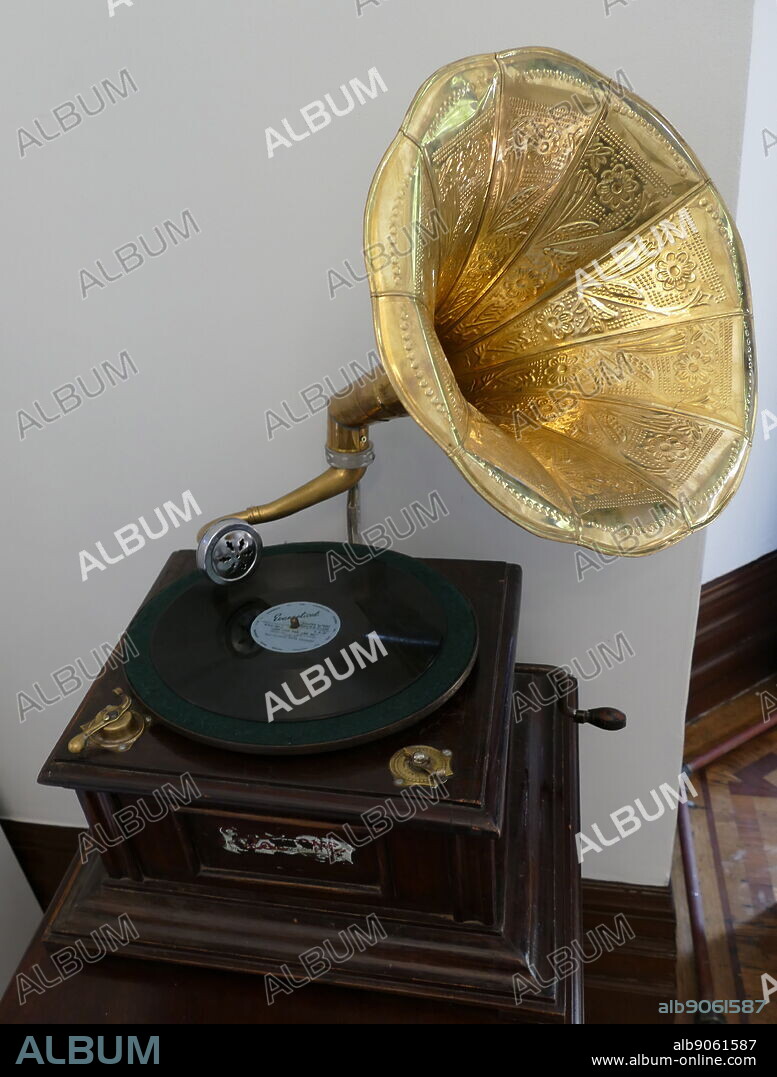 A Victor V phonograph, circa 1907. The phonograph was a device, invented in 1877, for the mechanical recording and reproduction of sound. In its later forms, it was also called a gramophone (as a trademark since 1887, as a generic name in the UK since 1910),.