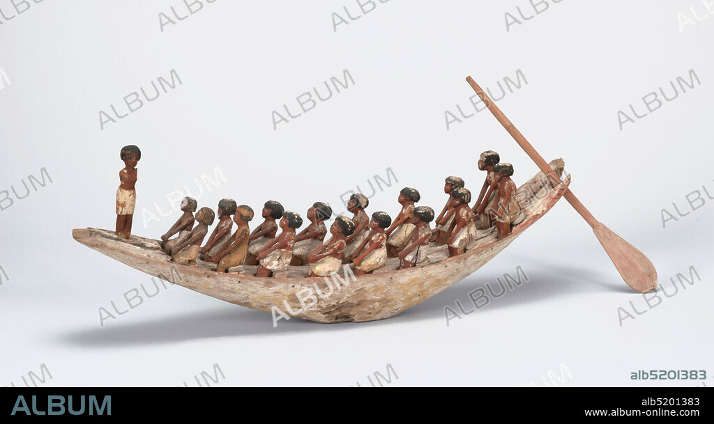 Model of a River Boat, wood, paint, Boat (a) with upward curving bow and stern, and flat-bottomed center. Eight pairs of oarsmen, dressed in white loin cloths, seated on square blocks. Pilot standing in bow. Helmsman and mast missing. Separate, long steering oar (b) with blade rounded at end; undecorated., Egypt, 20001700 BC, models and prototypes, Decorative Arts, funerary art, funerary art.