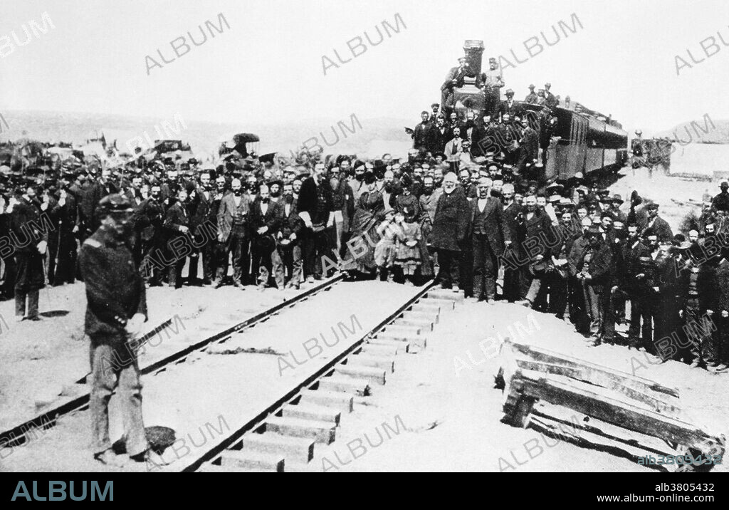 On May 10, in anticipation of the ceremony, Union Pacific No. 119 and Central Pacific No. 60 locomotives were drawn up face-to-face on Promontory Summit in the Utah Territory. It is unknown how many people attended the event; estimates run from as low as 500 to as many as 3,000; government and railroad officials and track workers were present to witness the event. Completing the last link in the Transcontinental Railroad with a spike of gold was the brainchild of David Hewes, a San Francisco financier and contractor. Two of the sides were engraved with the names of the railroad officers and directors. A special tie of polished California laurel was chosen to complete the line where the spike would be driven. The the ceremonial final spike driven by Leland Stanford to join the rails of the First Transcontinental Railroad across the United States connecting the Central Pacific and Union Pacific railroads.