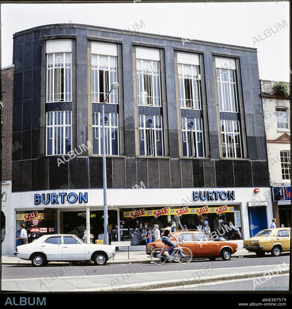 NICHOLAS ANTHONY JOHN PHILPOT. Burton, 2 - 6A High Street, Southampton, City of Southampton, 1982-1999. The curved dark granite facade of the Burton store at 2-6a High Street. The building was demolished in around 2018, although facade was retained with the intention to incorporate it into the new development on the site. The facade is one of several granite fronts to feature on Burton stores. Others include stores at Reading, Kingston upon Hull and Bournemouth.