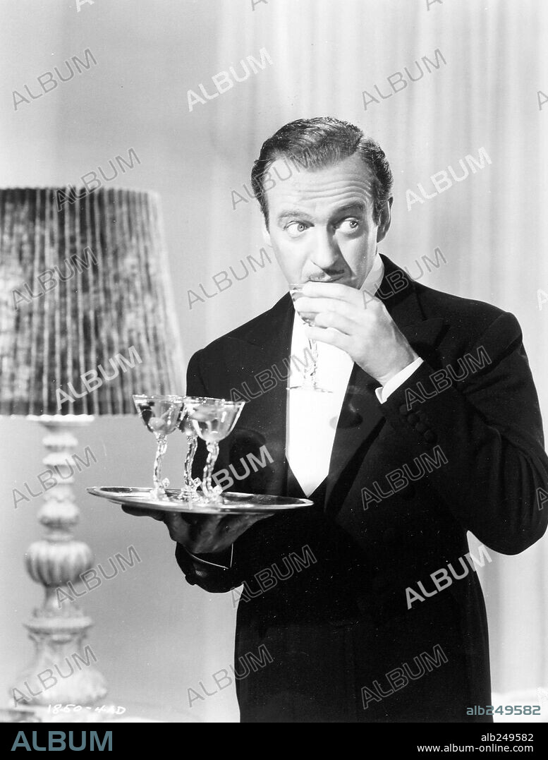 DAVID NIVEN in MY MAN GODFREY, 1957, directed by HENRY KOSTER. Copyright UNIVERSAL PICTURES.