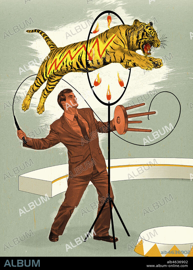 Tiger jumping through hoop for businessman lion tamer.