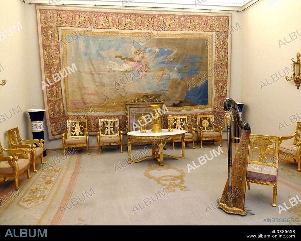 Drawing room of Tsar Nicholas II at the Winter Palace, St Petersburg, Russia. the Empire-style interior, of the drawing-room includes a part of a large furniture-set designed by the architect Luigi Rusca. The furniture with tapestry upholstery, commissioned by the Head of the Court Office, Dmitry Guryev, was made in 1805 - 1806 at the Imperial Tapestry Works.