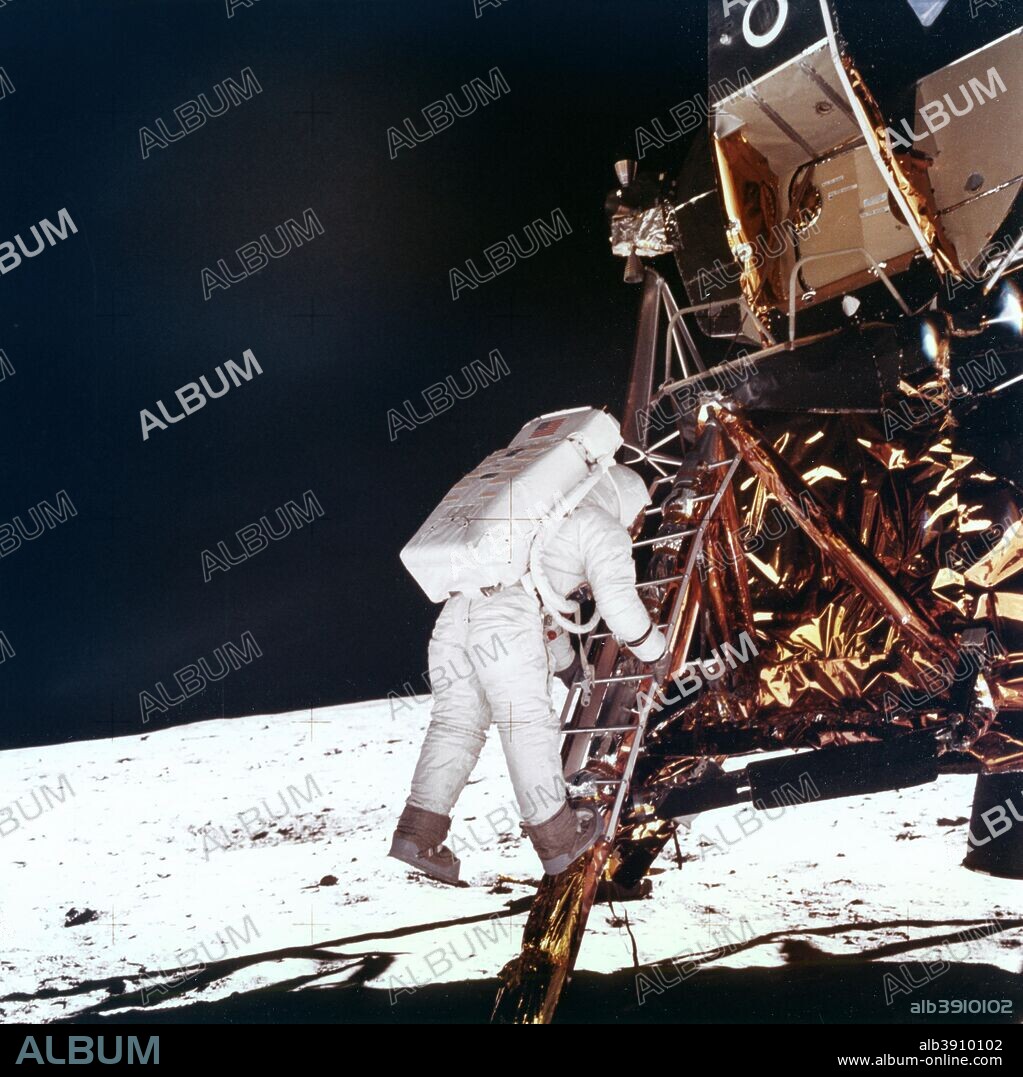 Edwin Buzz Aldrin (b1930) descends the steps of the Lunar Module ladder to walk on the Moon, 1969. This photograph was taken by Neil Armstrong.