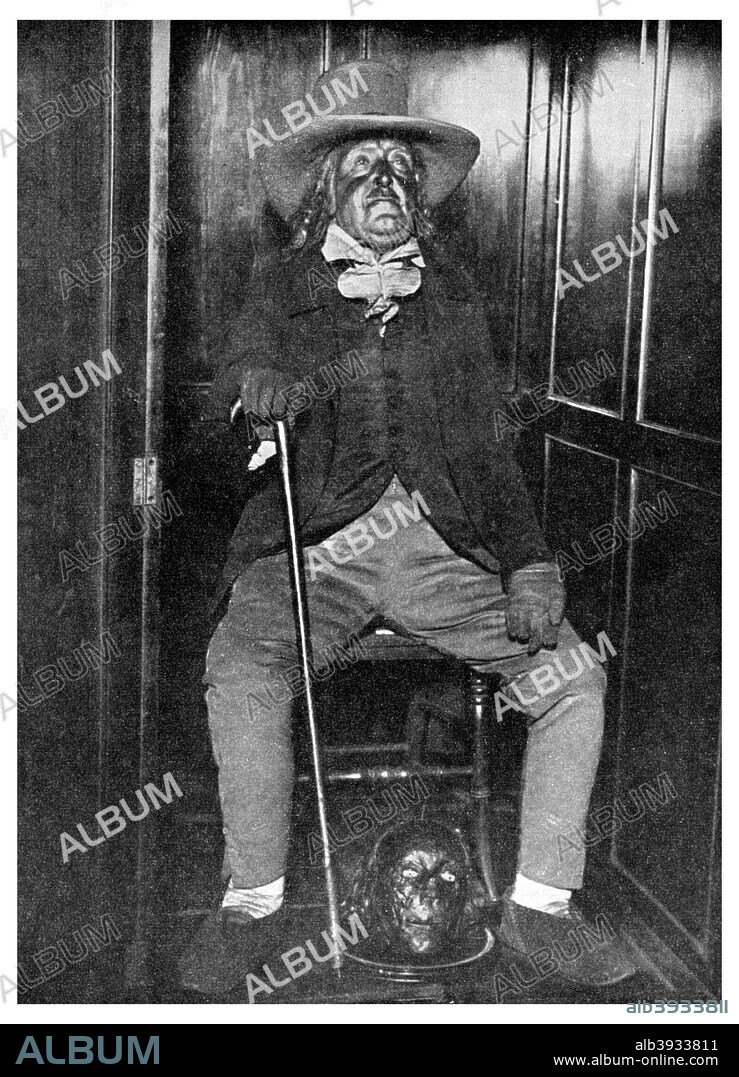 Effigy of Jeremy Bentham with his embalmed head, University College, London, 1956. English social reformer and philosopher Jeremy Bentham (1748-1832) established the doctrine of Utilitarianism and was a founder of University College. A print from People, a volume about the origin and early history of many things, common and less common, essential and inessential, by Readers Union, the Grosvenor Press, London, 1956.