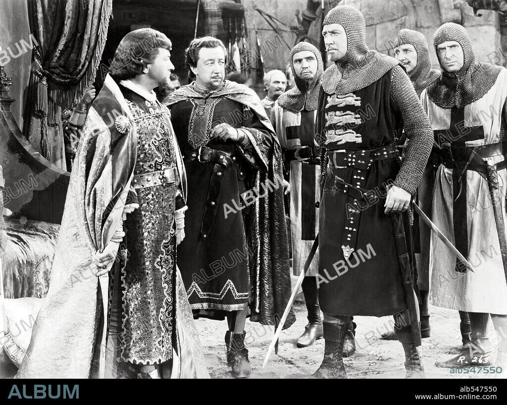 CLAUDE RAINS y MELVILLE COOPER en ROBIN DE LOS BOSQUES, 1938 (THE ADVENTURES OF ROBIN HOOD), dirigida por MICHAEL CURTIZ y WILLIAM KEIGHLEY. Copyright WARNER BROTHERS.