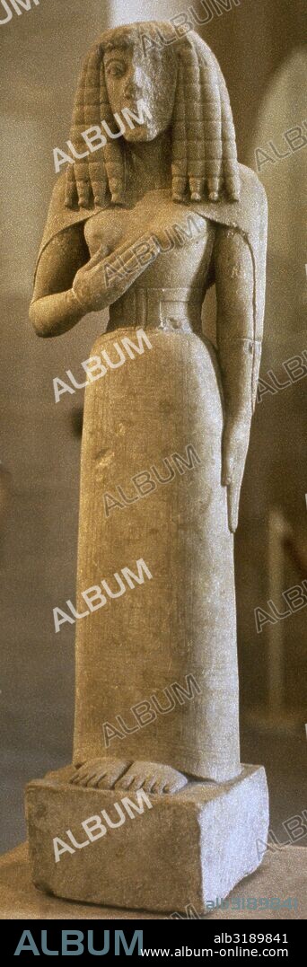 Lady of Auxerre (Kore of Auxerre). Archaic Greek goddess (c. 650-625 BC). Louvre Museum. Paris, France.