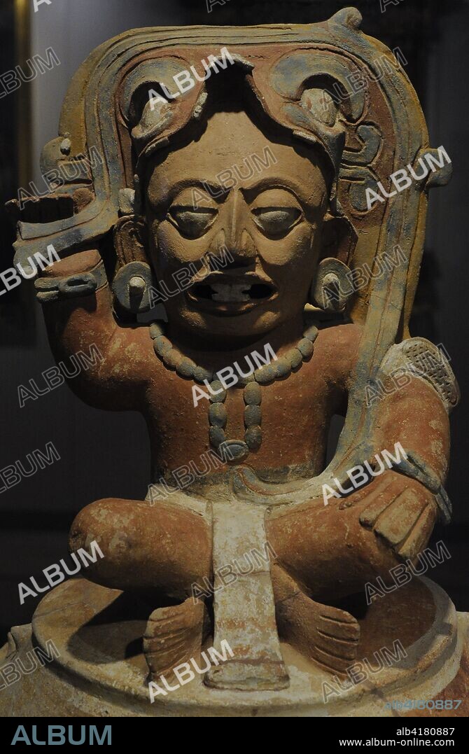 Funerary urn with depiction of the solar god Kinich Ahau. Detail of the image of the deceased on the cover. Painted ceramic. Maya culture. Late Classic Period (600-900 AD). Mesoamerica. Maya area. Museum of the Americas. Madrid, Spain.