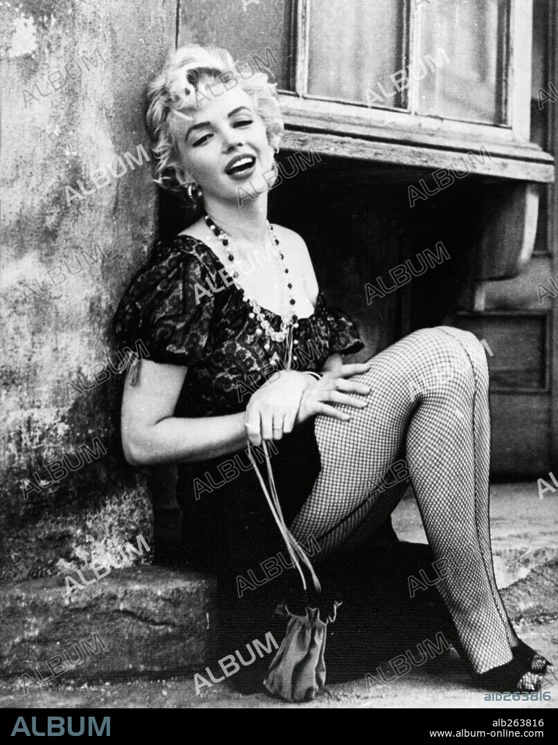 NORMA JEAN BAKER. MARILYN MONROE in BUS STOP, 1956, directed by JOSHUA LOGAN. Copyright 20TH CENTURY FOX.
