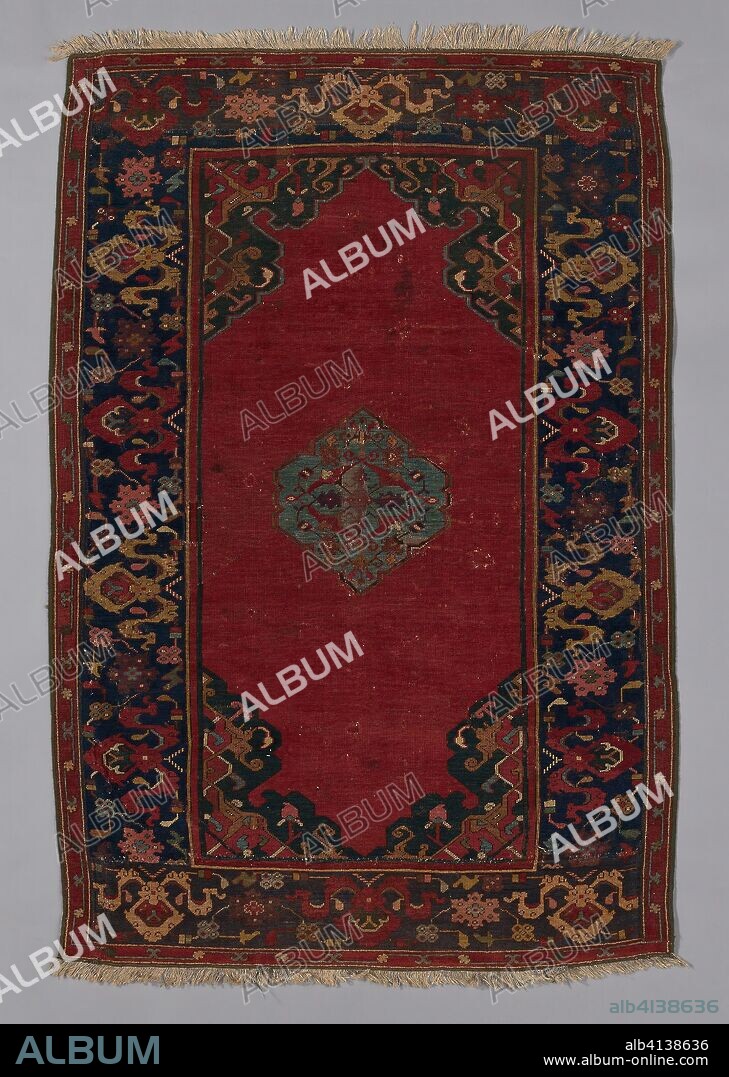 Carpet (Ushak double-ended prayer rug). Probably Romania. Date: 1601-1700. Dimensions: 170.6 x 110.8 cm (67 1/8 x 43 5/8 in.). Wool, plain weave with supplementary wrapping wefts forming cut pile through a technique known as "Ghiordes (Turkish) knots". Origin: Romania.