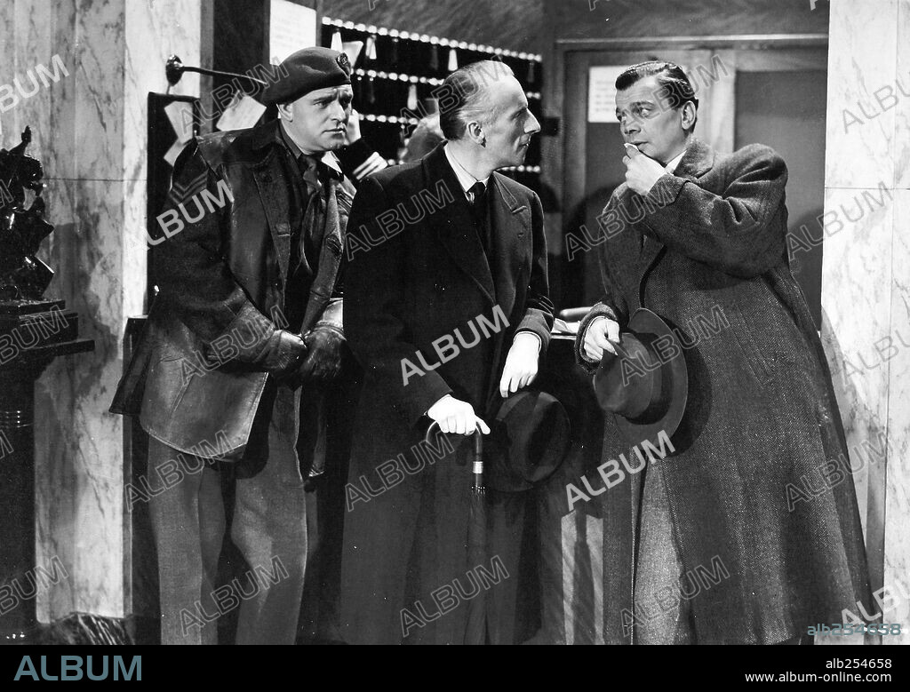 BERNARD LEE, JOSEPH COTTEN and WILFRID HYDE WHITE in THE THIRD MAN, 1949, directed by CAROL REED. Copyright LONDON FILMS.