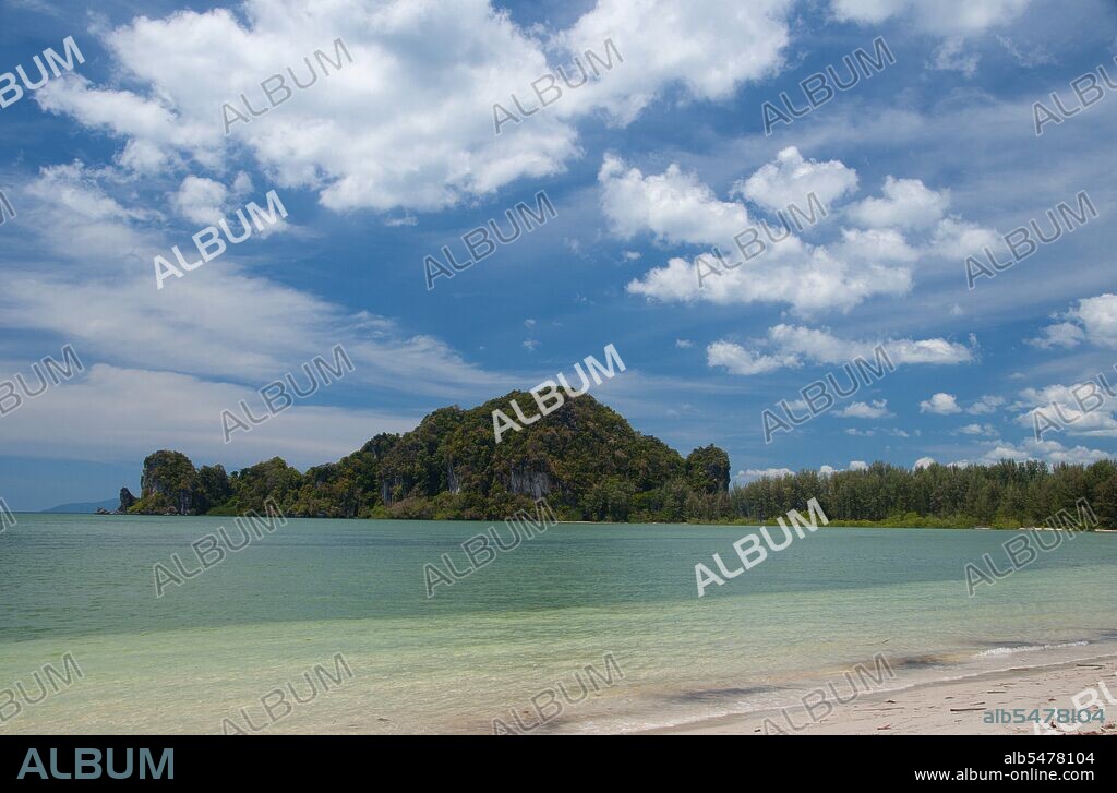 The varied coastal landscape of Hat Chao Mai National Park includes mangrove creeks, coastal karsts, and hidden beaches accessed through caves. Some of Trang’s many offshore islands, are under park protection including Ko Kradan, Ko Cheuk and Ko Muk. Rare dugongs can sometimes be spotted in the shallow waters and seagrass beds between the mainland and the islands; other mammals include sea otters and dolphins at sea, and langur, macaque, pangolin and wild boar on land. Trang province was dependent on tin mining until the first rubber seedlings were brought into Thailand around 1901 – part of a long journey from South America via the neighboring Malay States. Rubber, palm oil and fishing are the mainstays of the province's economy. Tourism is making an increasing impact as Trang’s Anadaman Coast and islands are increasingly developed and popularized.