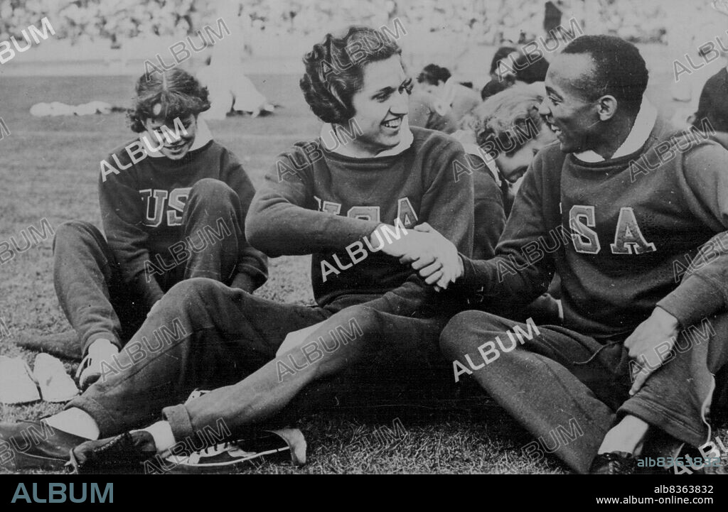 Miss Helen Stephens & Jesse Owens congratulating each other at the Olympic Games. August 31, 1936. (Photo by Associated Press Photos).