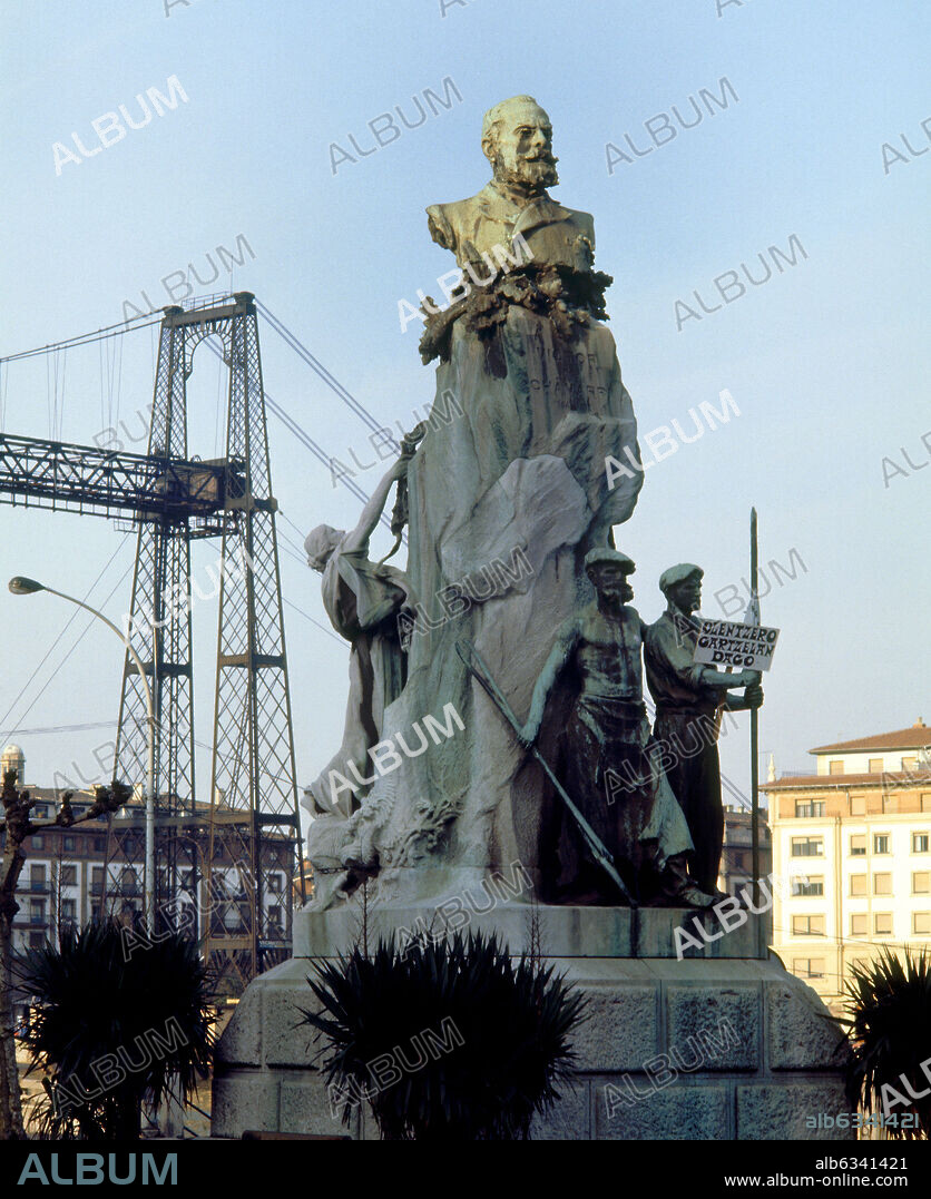 MIGUEL BLAY (1866-1936). MONUMENTO A VICTOR CHAVARRI Y SALAZAR, 1903, FUNDADOR DE LA SOCIEDAD METALURGICA LA VIZCAYA MARCANDO EL PROGRESO ECONOMICO DE BILBAO.