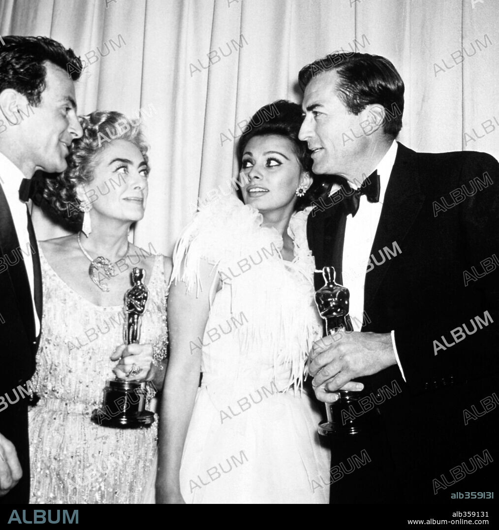 GREGORY PECK, JOAN CRAWFORD and SOPHIA LOREN. The 35th Academy Awards / 1963. 
Gregory Peck, best actor for "To Kill A Mockingbird". Joan Crawford picks up on behalf of Anna Bancroft the best actress award for "The Miracle Worker". Sophia Loren, presenter of the best actor award. 1963