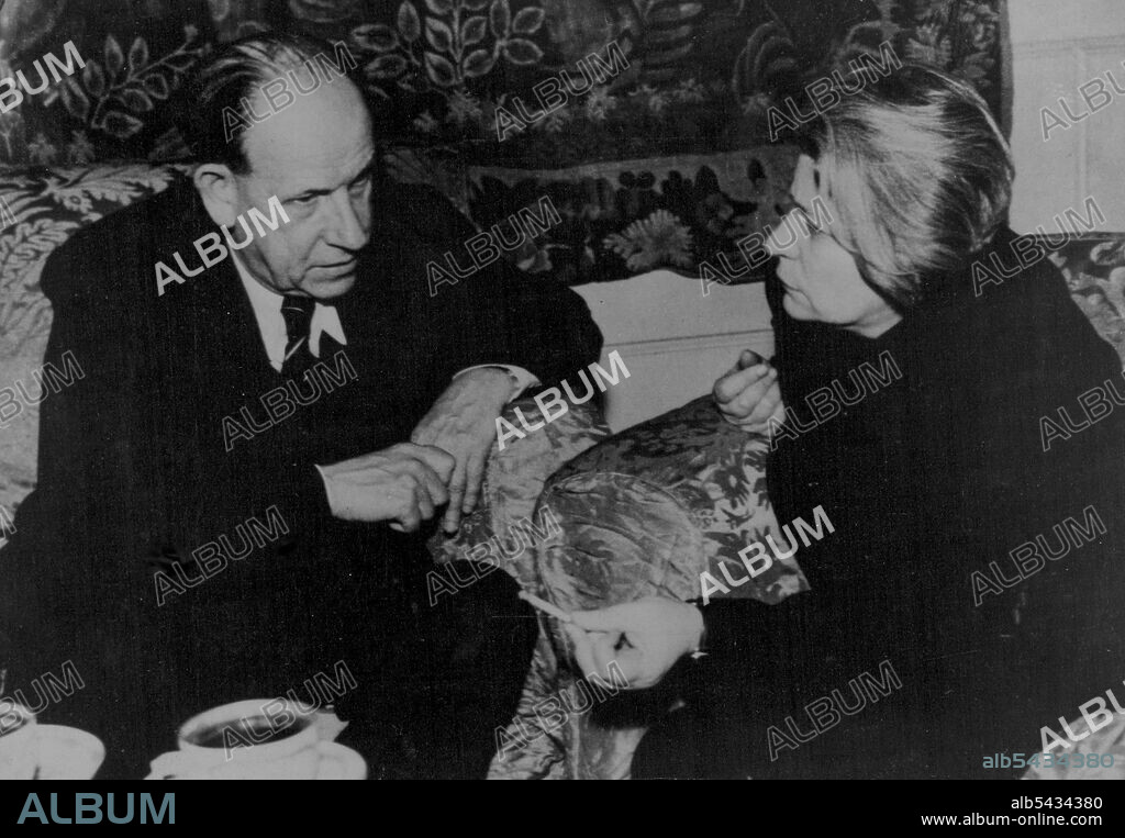 Red Anna' Is Promoted -- Mme. Anna Pauker Rumania's foreign minister and now appointed a vice premier, talking with Czech premier Antonin Zapotocky (also a Communist) during the Czech visit to Bucharest to exchange ratification documents on the defense treaty agreed by the two nations. Mme. Pauker, known as 'Red Anna' from her ardent communist sympathies, replaces as vice premier one of the general Cominform policy to strengthen the power of the Soviet-type presidium at the expense of the norm.