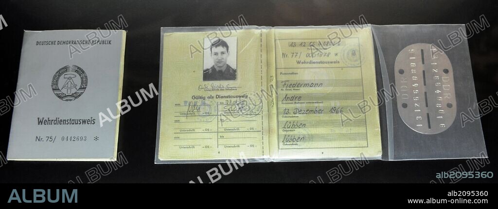 East Germany (GDR). Certificate of military service and nameplate. 60's. 20th century. DDR Museum. Berlin. Germany.
