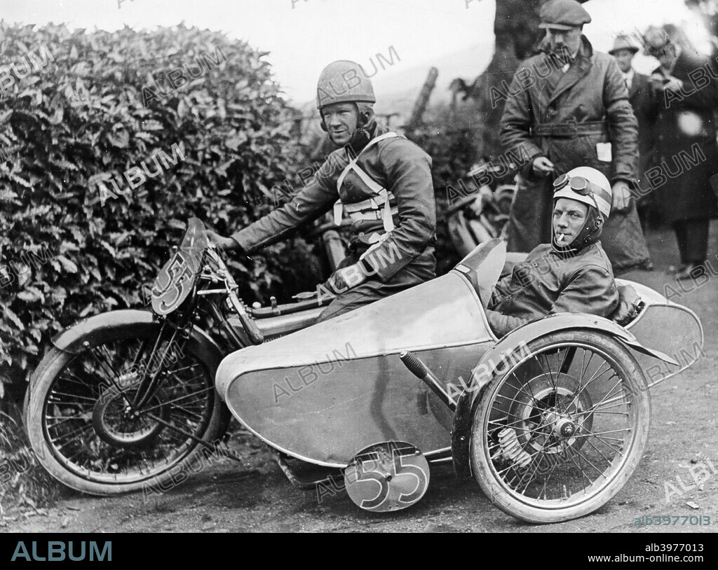 Freddie Dixon and passenger Walter Denny, Isle of Man sidecar TT race, 1923. Dixon and Denny won the race on this Douglas machine, the first sidecar TT, add an average speed of 53.15 mph. The banking sidecar chassis was designed and built by Freddie Dixon. The complete outfit could be banked to either side for optimal cornering speeds. The sidecar wheel was mounted on a 7inch crank, raised or lowered by the passenger with the long lever in front of the wheel.