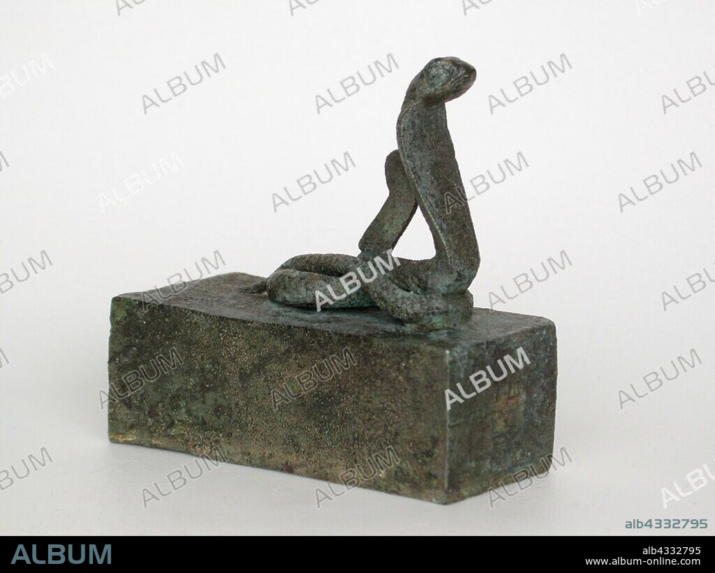 Coffin with Cobra (Atum) and Ostrich Feather of Goddess Maat on the Top, Late Period–Ptolemaic Period (664–30 BC), Egyptian, Egypt, Bronze, 8.4 × 4.1 × 8.6 cm (3 5/16 × 1 5/8 × 3 3/8 in.).
