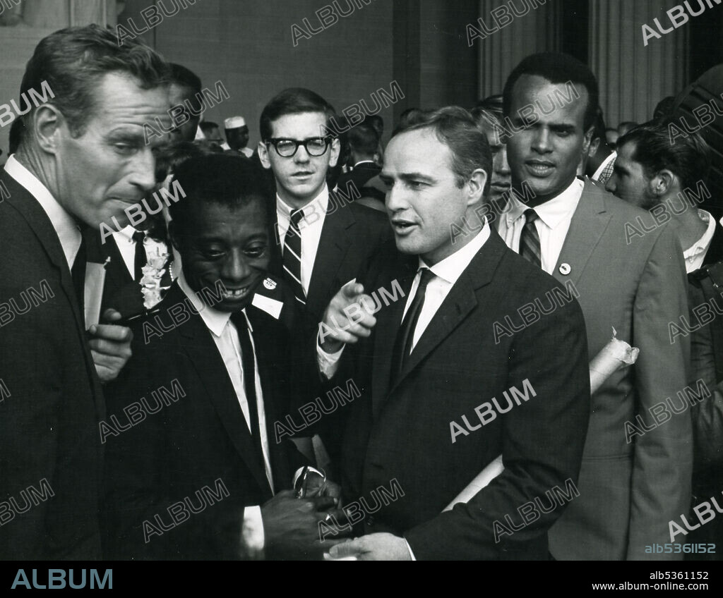 Actor Charleton Heston, writer James Baldwin, actor Marlon Brando and singer Harry Belafonte at March on Washington, 8/28/63. Rowland Scherman/GG Vintage Images/UIG.