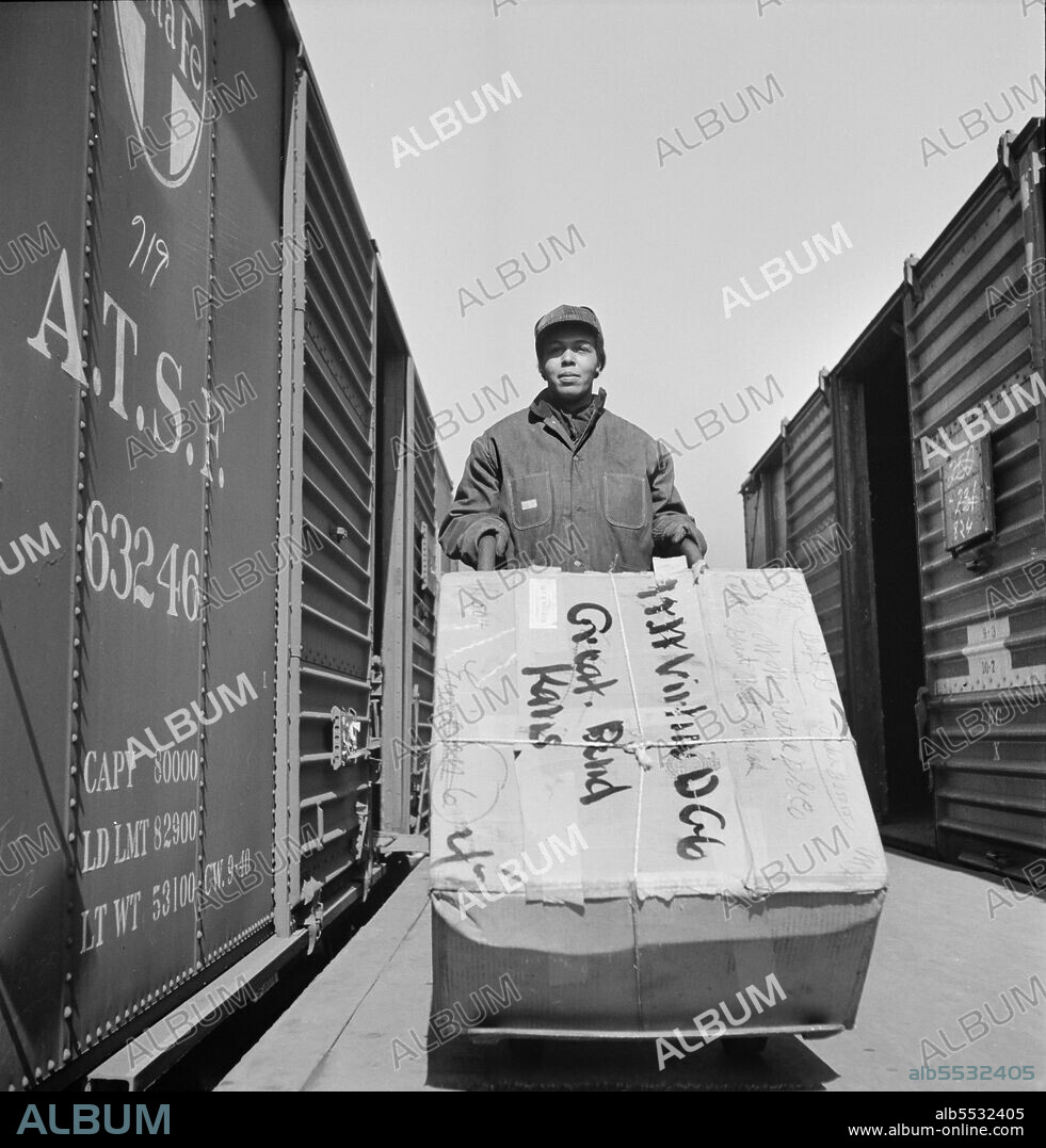 Hortense W. Thompson, one of several Women Freight Handlers employed at Atchison, Topeka, and Santa Fe freight Depot, Kansas City, Missouri, USA, Jack Delano, U.S. Farm Security Administration, U.S. Office of War Information Photograph Collection, March 1943.