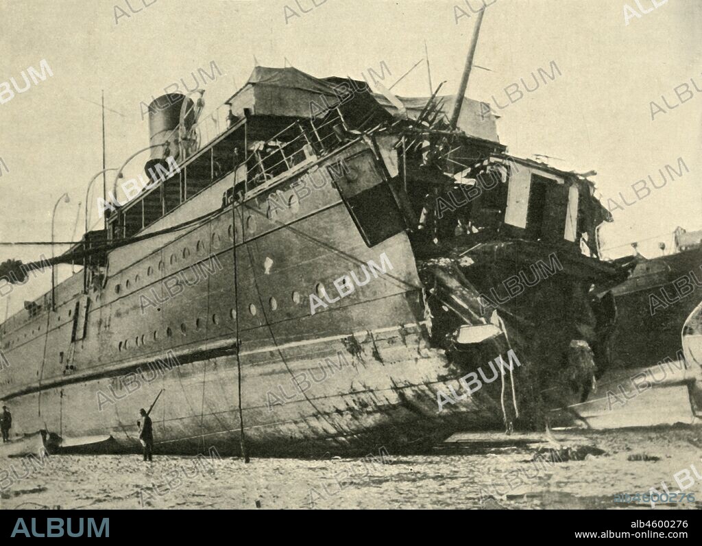 'The Torpedoing of the Channel Steamer Sussex', First World War, March 1916, (c1920). '...view of the vessel beached at Boulogne, showing how the bows were blown clean off by the explosion'. On 24 March 1916, the passenger ferry SS 'Sussex' was torpedoed by a German U-boat in the Channel between Folkestone and Dieppe. The ship was severely damaged and many passengers were drowned - some sources say at least 50 were killed, with the figure 80-100 also suggested. From "The Great World War: A History", Volume V, edited by Frank A Mumby. [The Gresham Publishing Company Ltd, London, c1920].