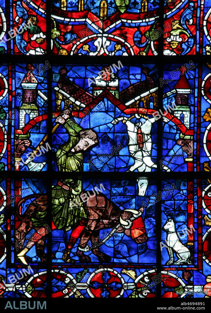 Bouchers au travail, abattage d'une vache. Vitrail de la cathedrale de Chartres datant du 13e, XIIIe s. Photographie par Painton Cowen. Credit : Collection COWEN/KHARBINE-TAPABOR.