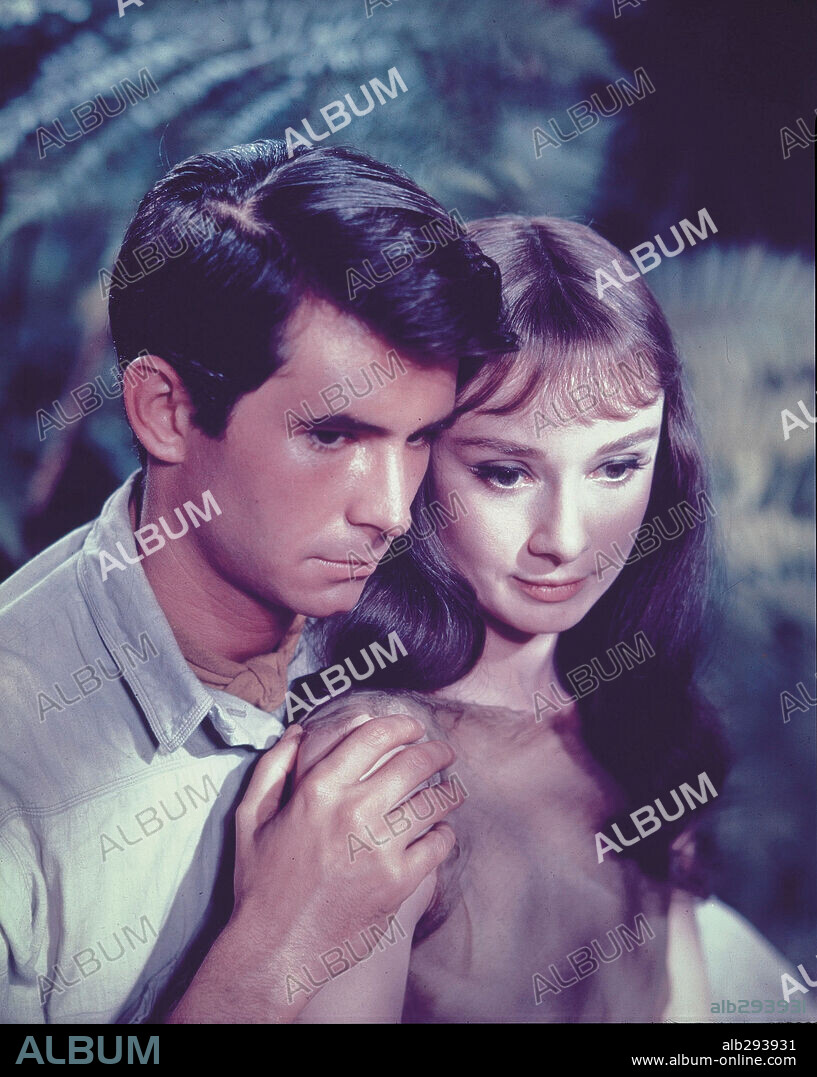 ANTHONY PERKINS and AUDREY HEPBURN in GREEN MANSIONS, 1959, directed by MEL FERRER. Copyright M.G.M.