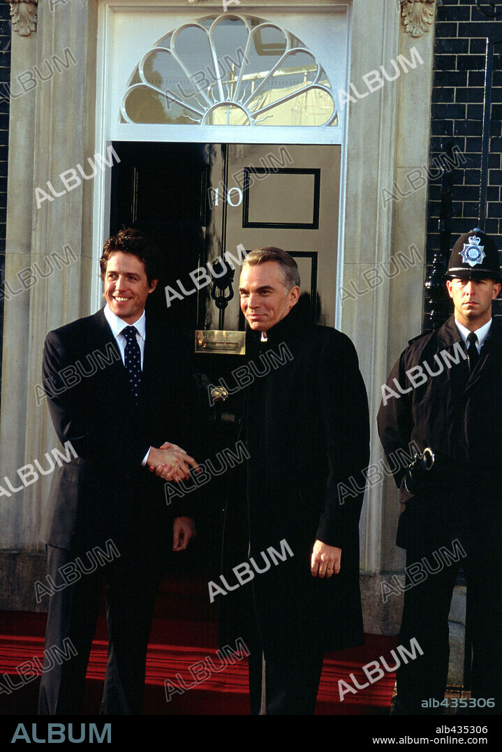 BILLY BOB THORNTON and HUGH GRANT in LOVE ACTUALLY, 2003, directed by RICHARD CURTIS. Copyright UNIVERSAL STUDIOS / MOUNTAIN, PETER.