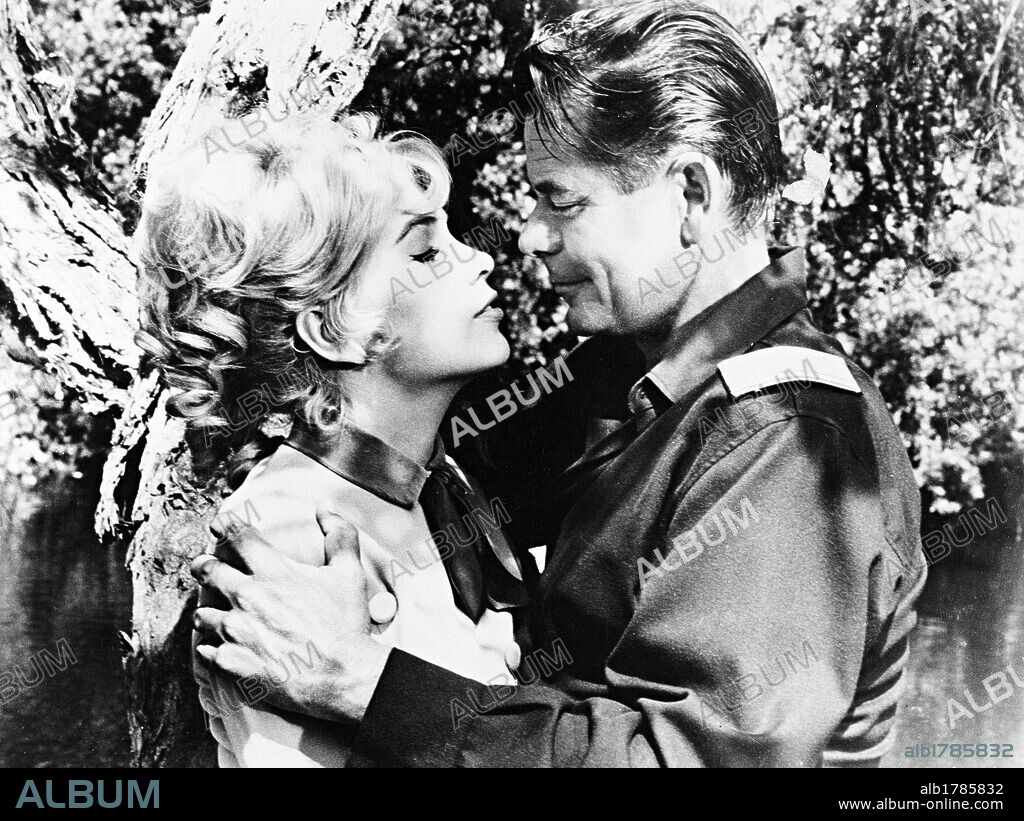 GLENN FORD and STELLA STEVENS in ADVANCE TO THE REAR, 1964, directed by GEORGE MARSHALL. Copyright M.G.M.